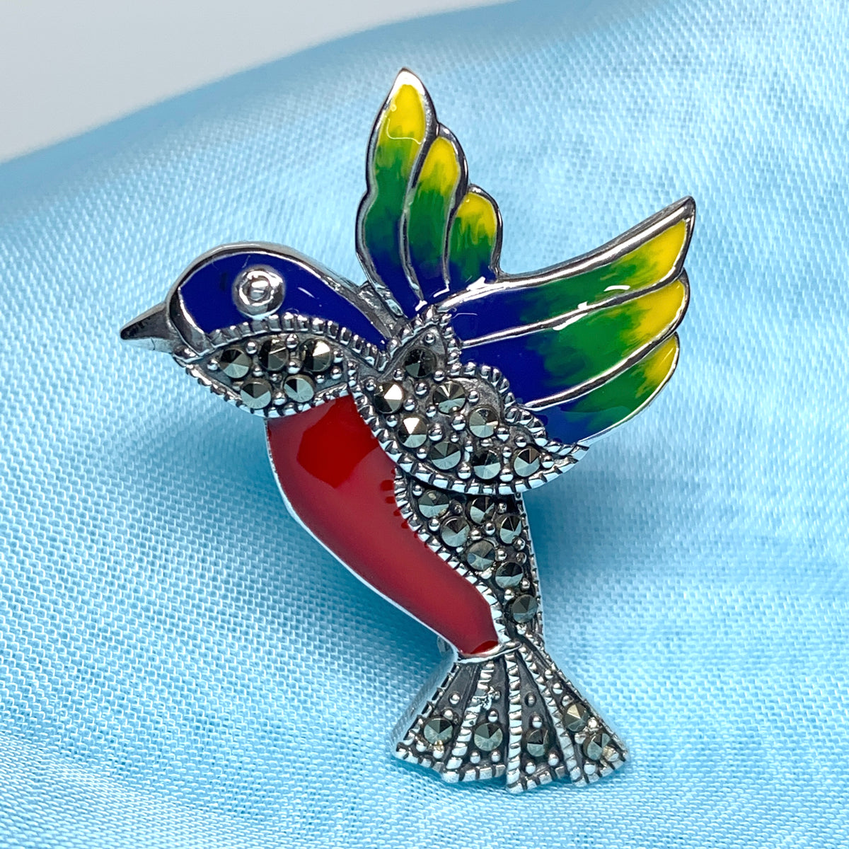 Marcasite flying hummingbird sterling silver brooch