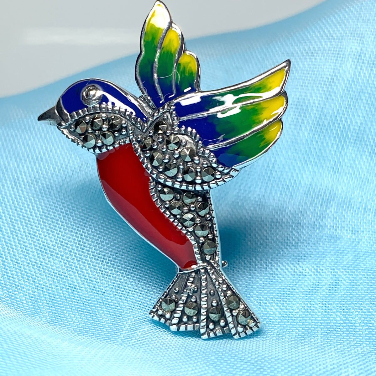 Marcasite flying hummingbird sterling silver brooch