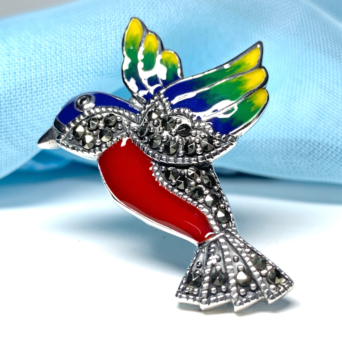 Marcasite flying hummingbird sterling silver brooch