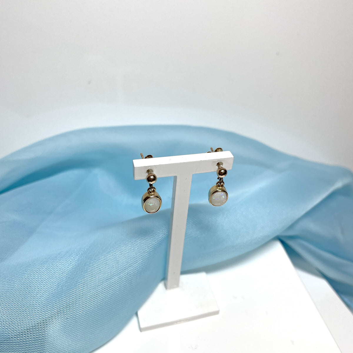 Opal drop oval yellow gold earrings