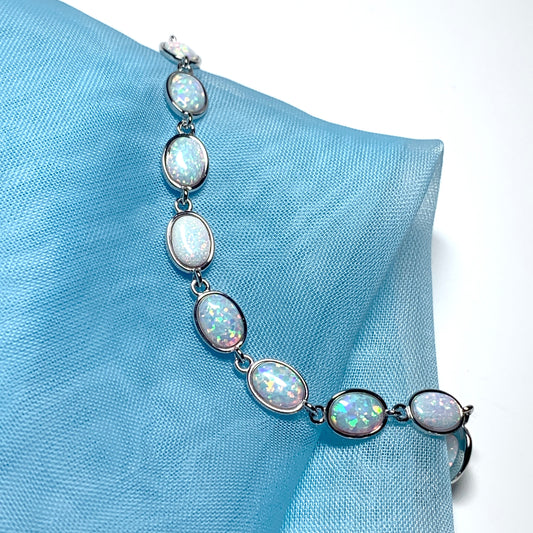 Oval opal sterling silver bracelet