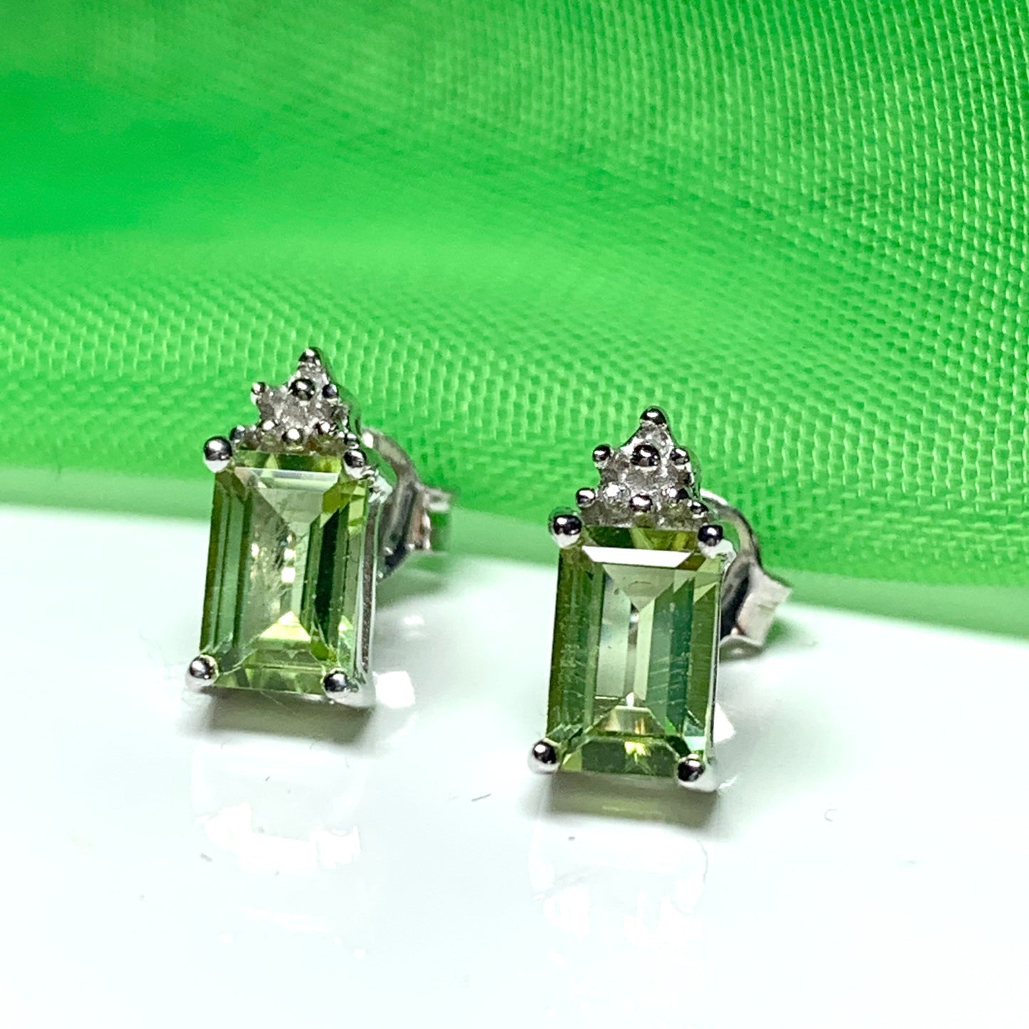 Peridot and diamond silver stud earrings