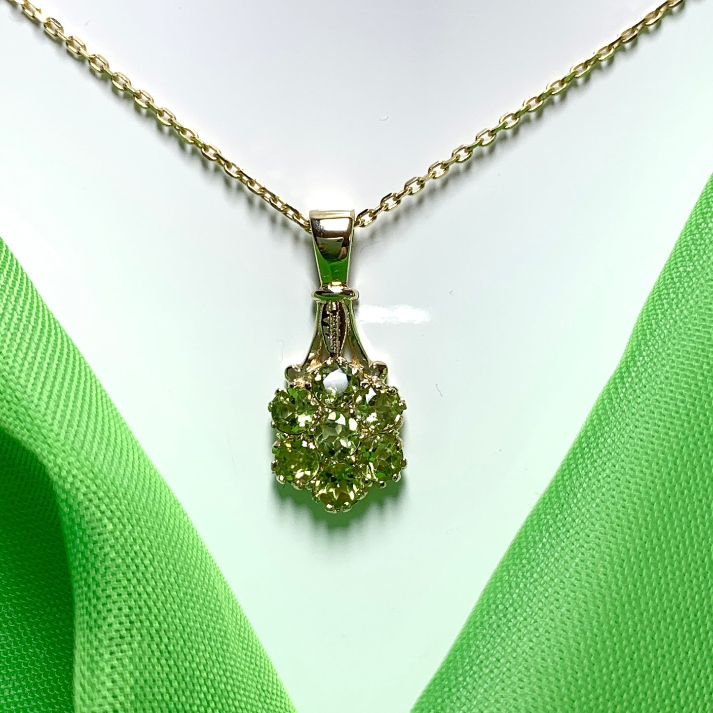 Peridot round cluster yellow gold necklace