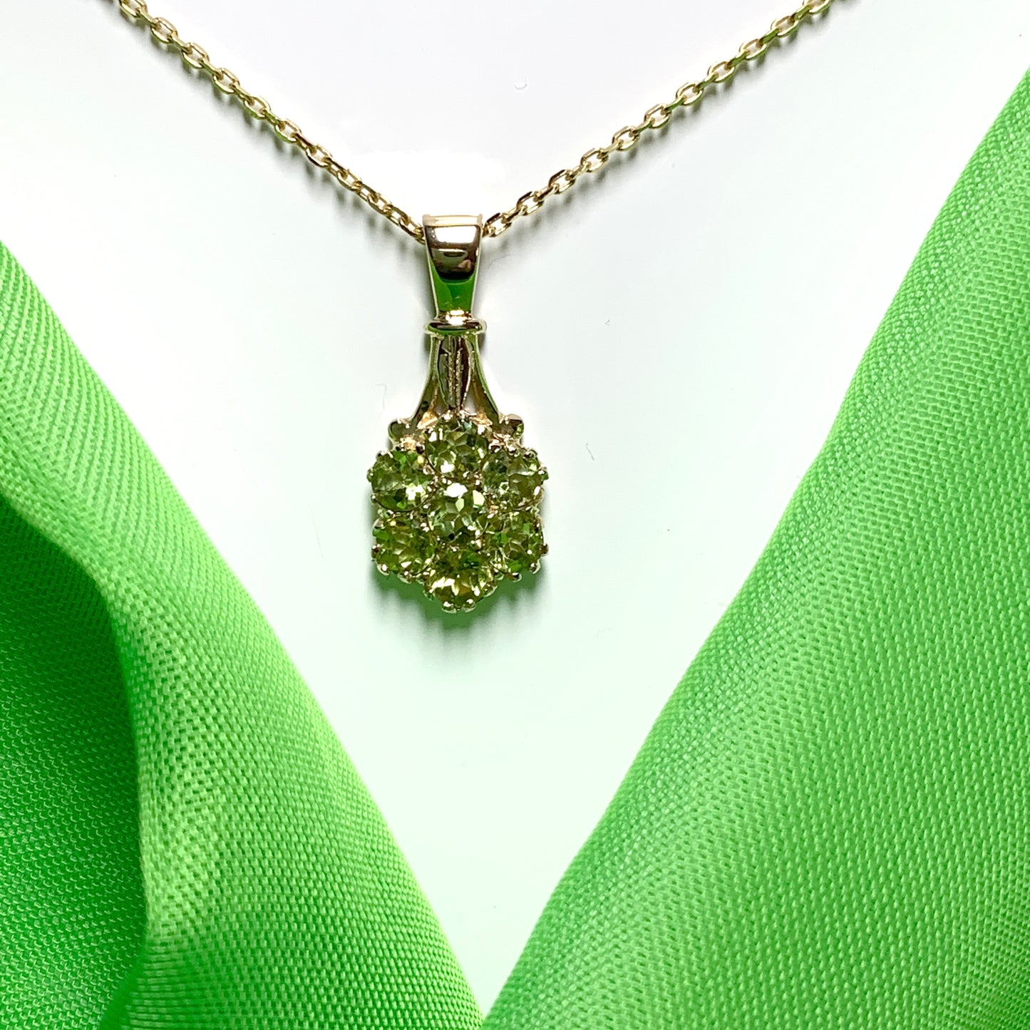 Peridot round cluster yellow gold necklace