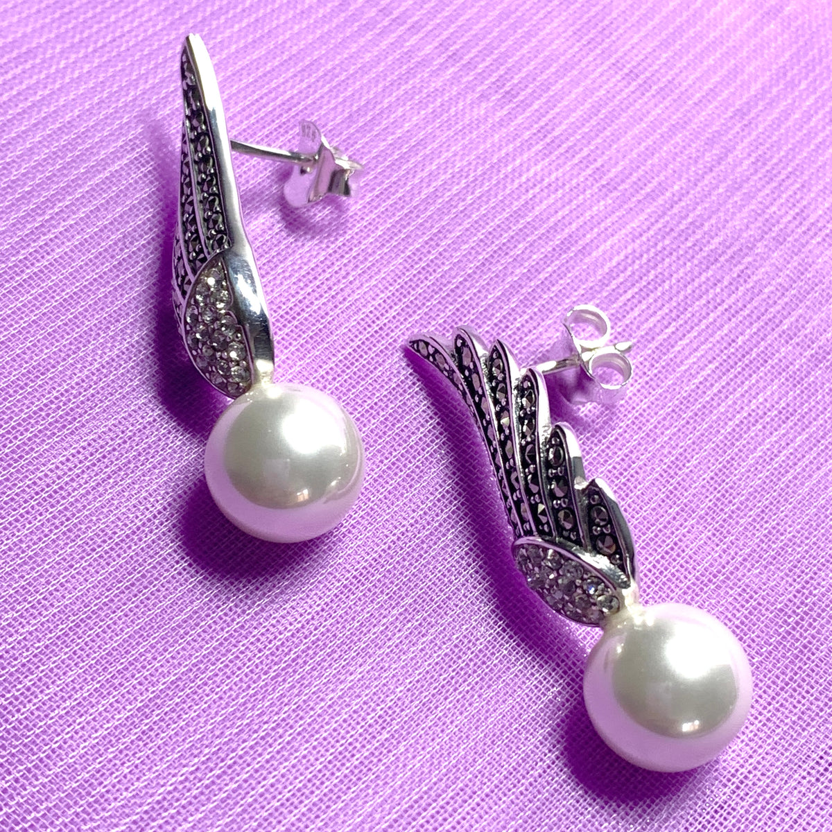 Sterling Silver Angle Wing Stud Earrings with Marcasite and Fresh Water Pearl