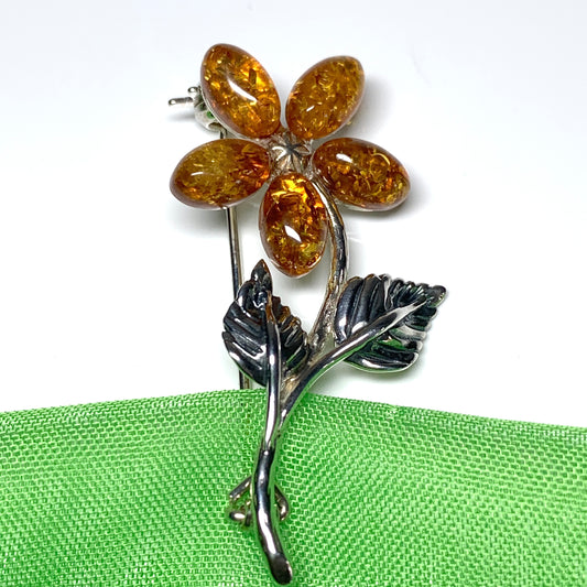 Sterling silver flower amber brooch