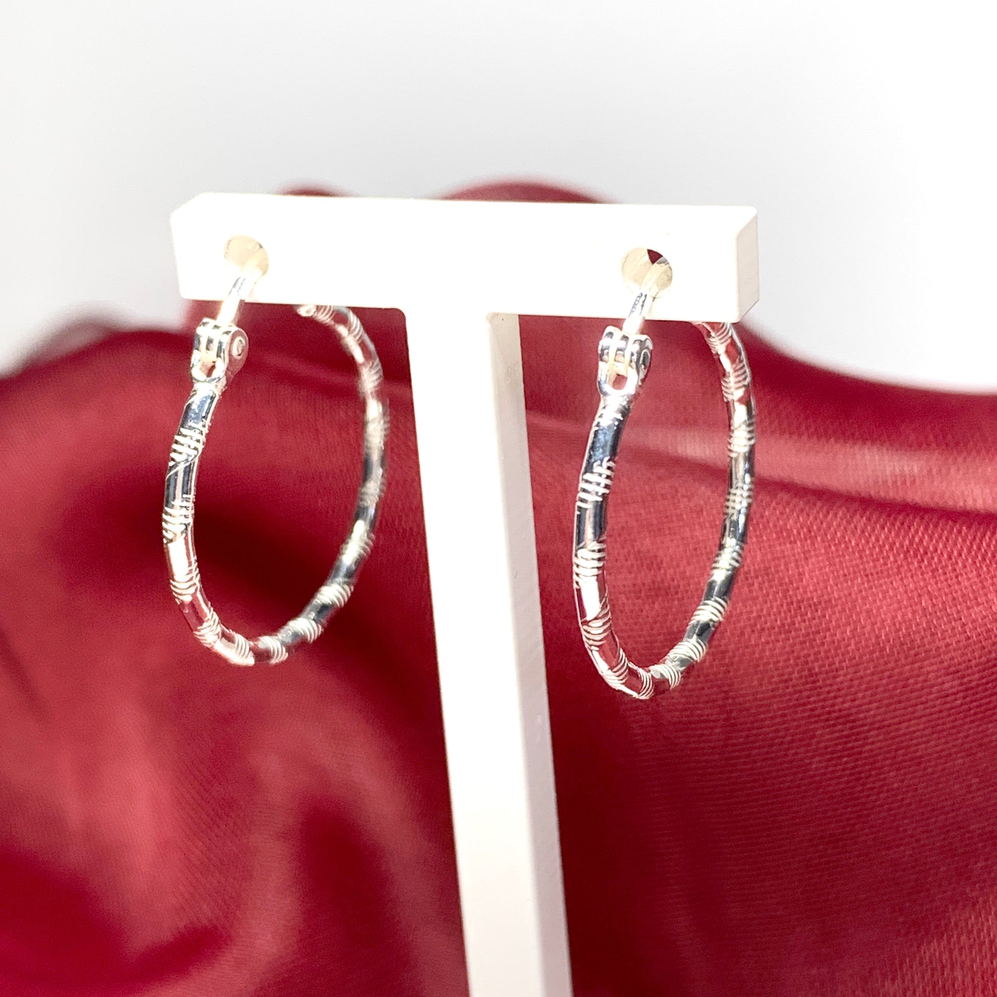 Sterling silver patterned hoop earrings