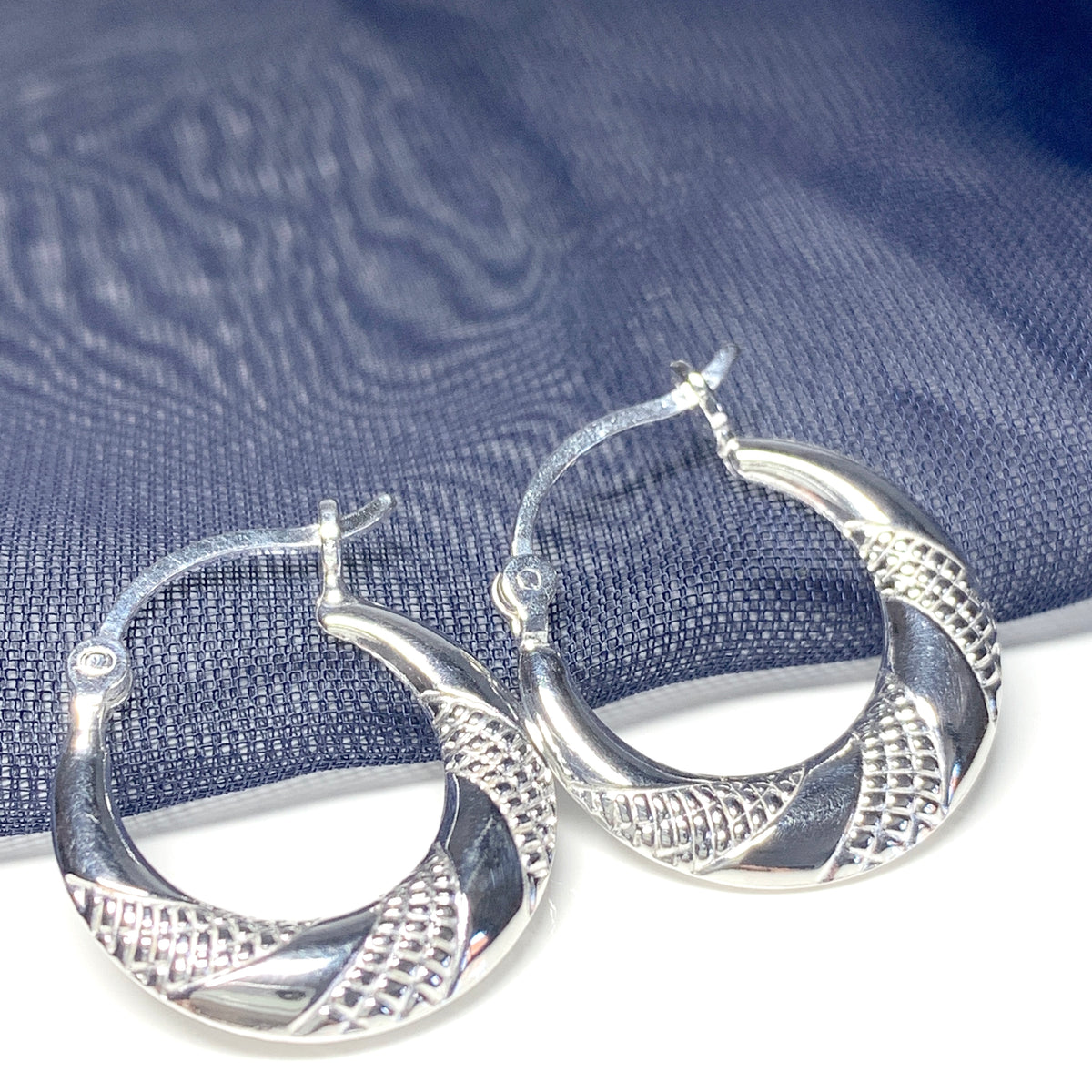 Sterling silver patterned round earrings creole shaped