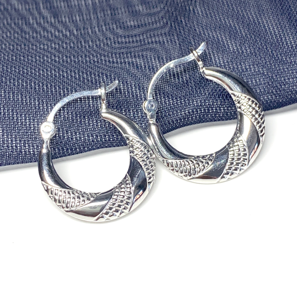 Sterling silver patterned round earrings creole shaped