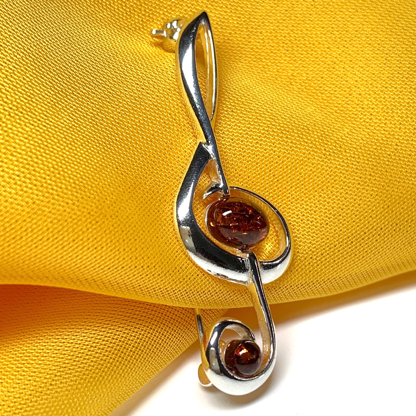 Treble clef musical orange real amber silver brooch