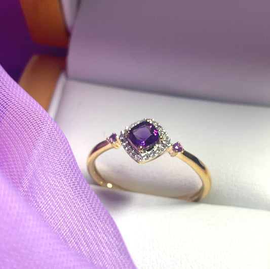 Amethyst and diamond yellow gold cluster ring