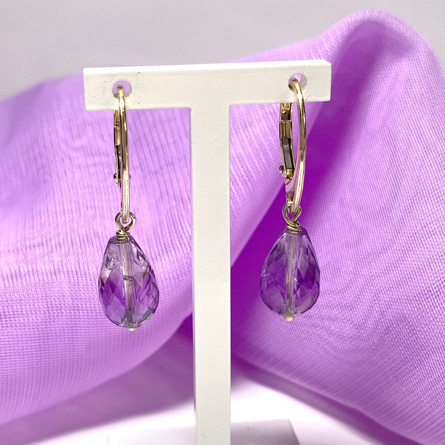 Amethyst teardrop shaped yellow gold drop earrings