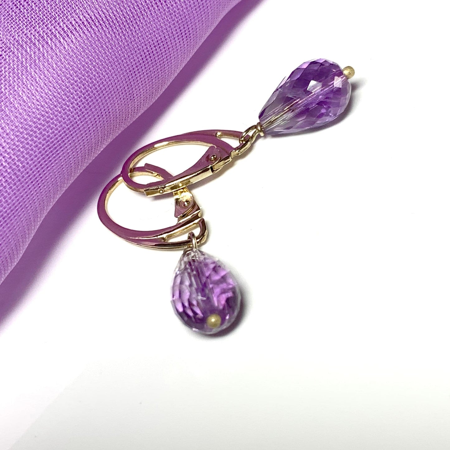 Amethyst teardrop shaped yellow gold drop earrings