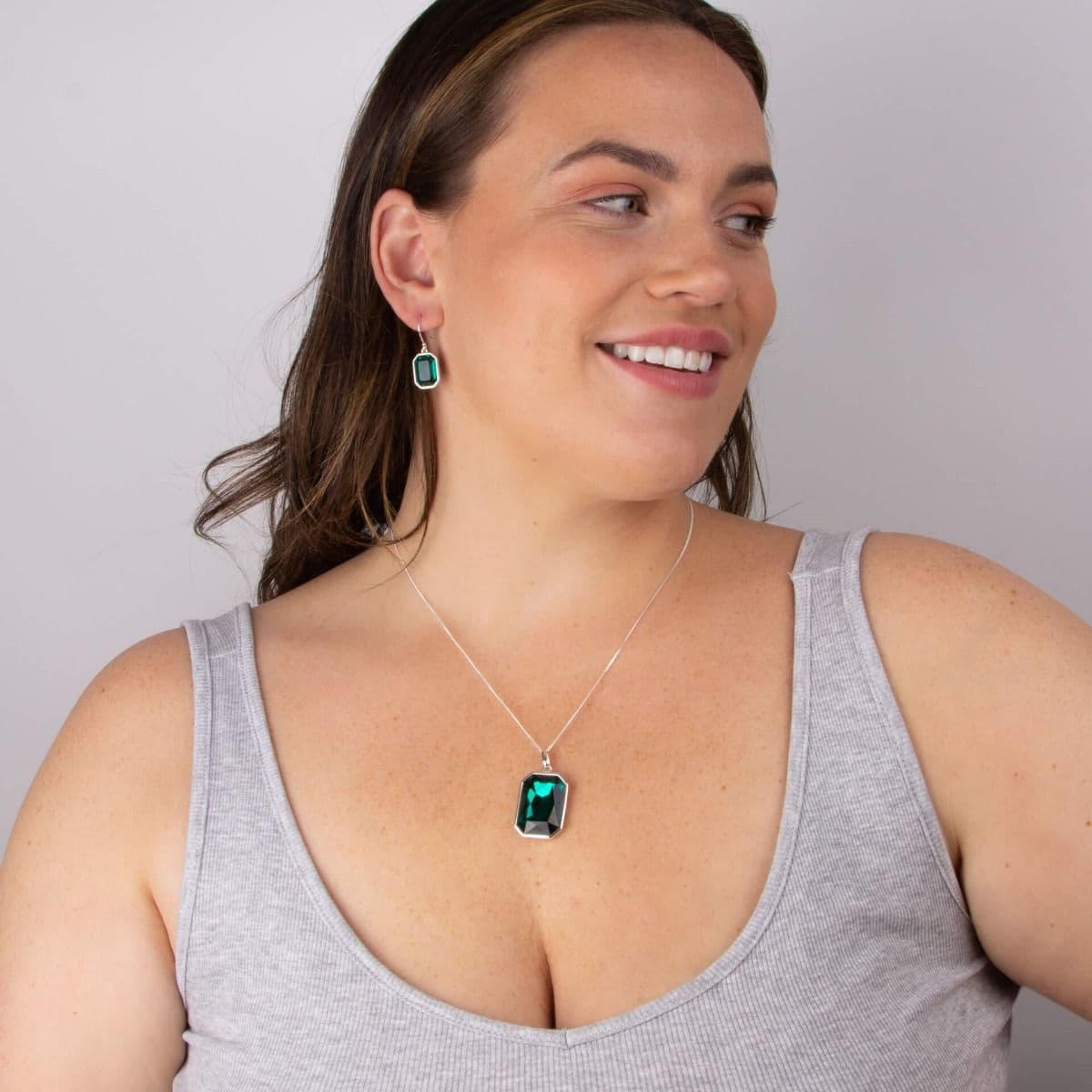 Large emerald green crystal octagonal drop earrings