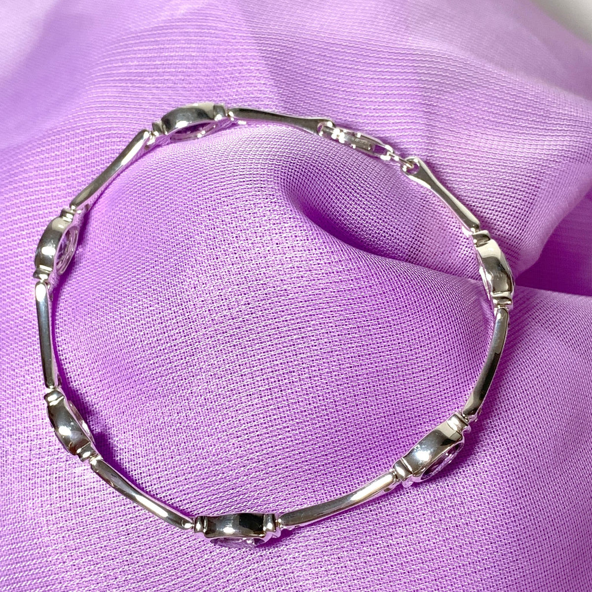 Oval purple amethyst sterling silver bracelet