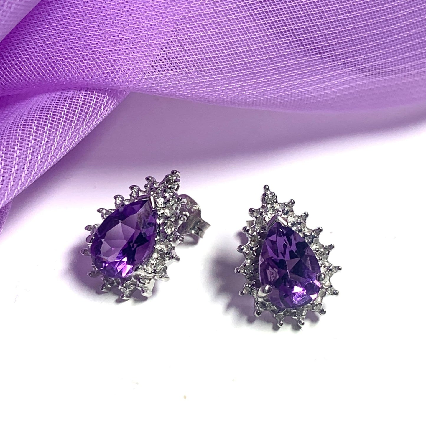 Pear shaped purple amethyst and diamond sterling silver cluster stud earrings