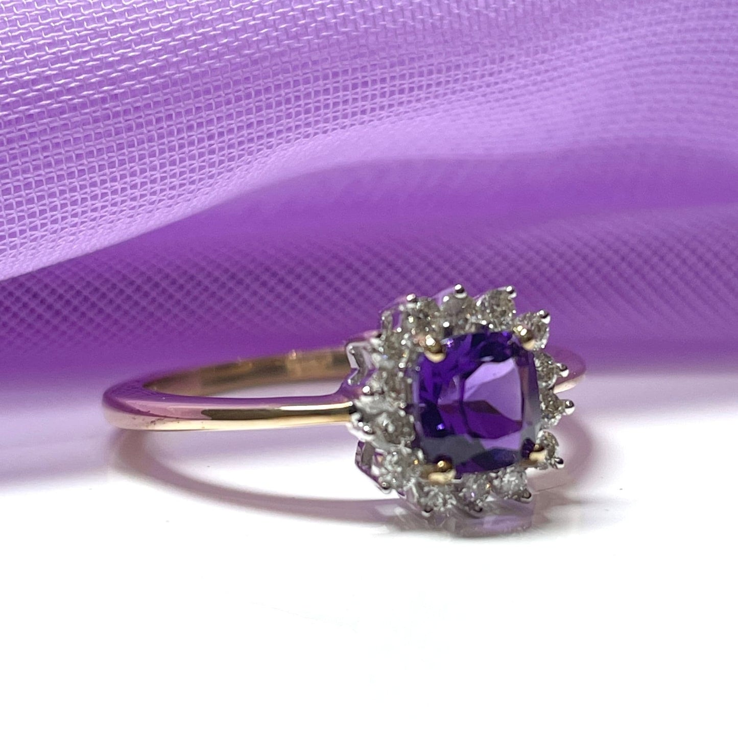 Purple amethyst and diamond cluster dress ring yellow gold
