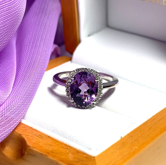 Purple oval amethyst and diamond white gold cluster ring