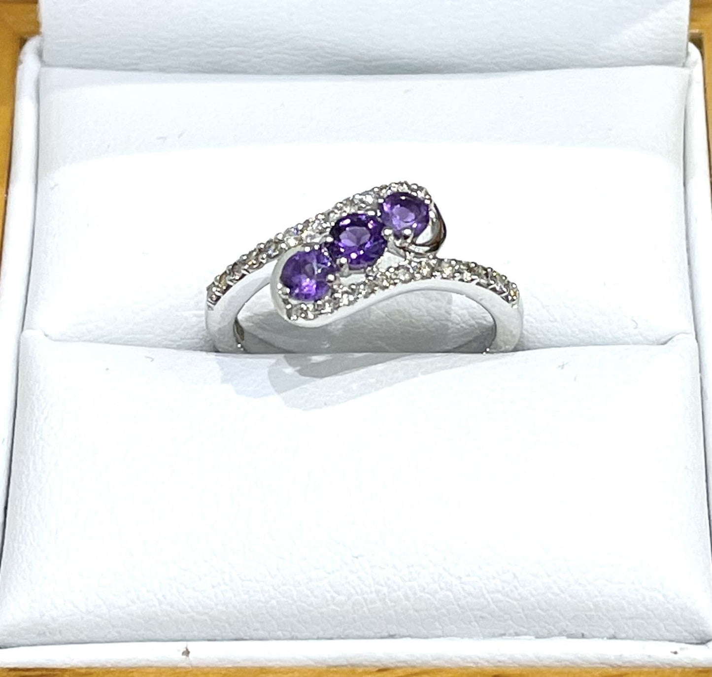 Purple twisted amethyst and diamond dress ring white gold