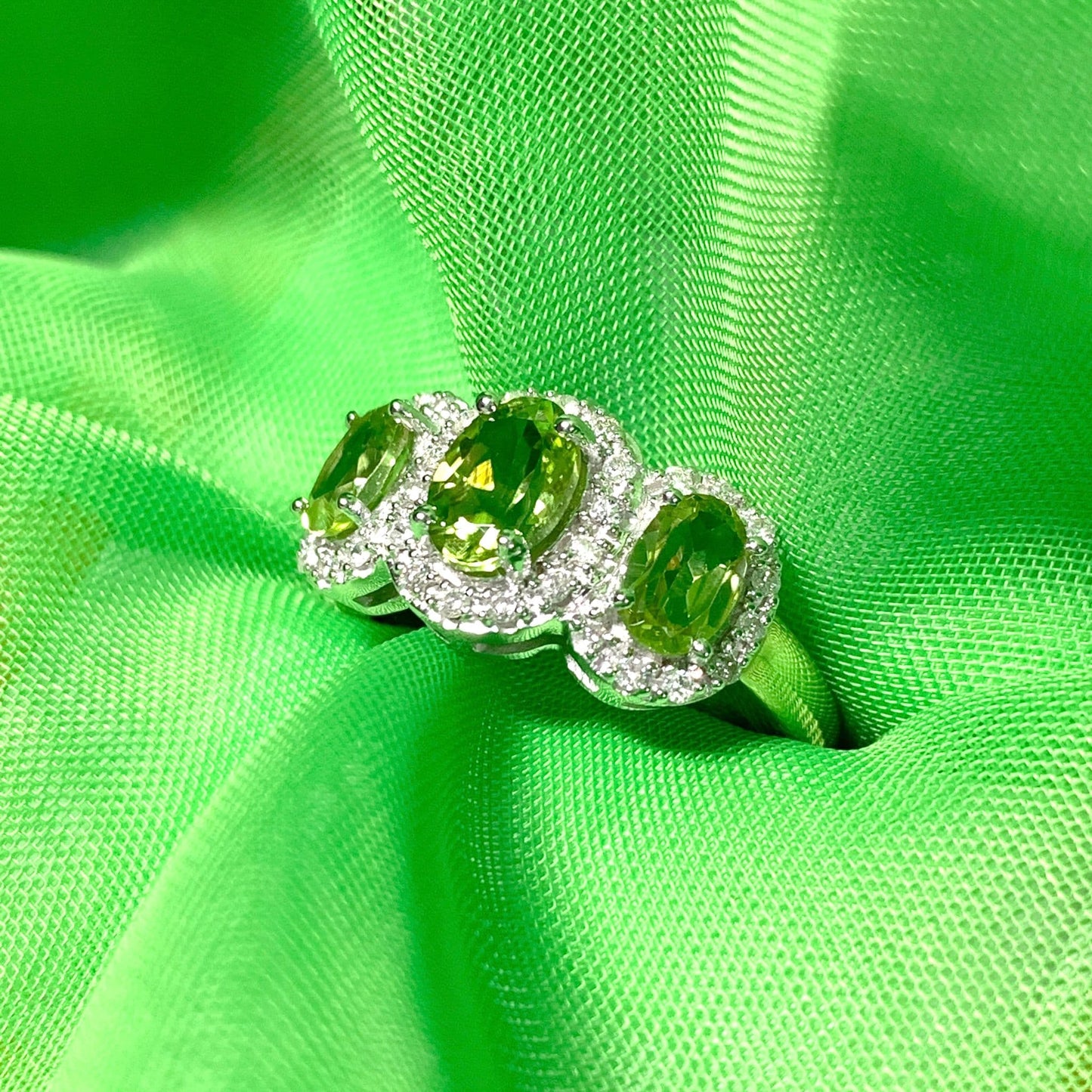 Trilogy Triple Oval Peridot and Diamond Yellow Gold Cluster Ring