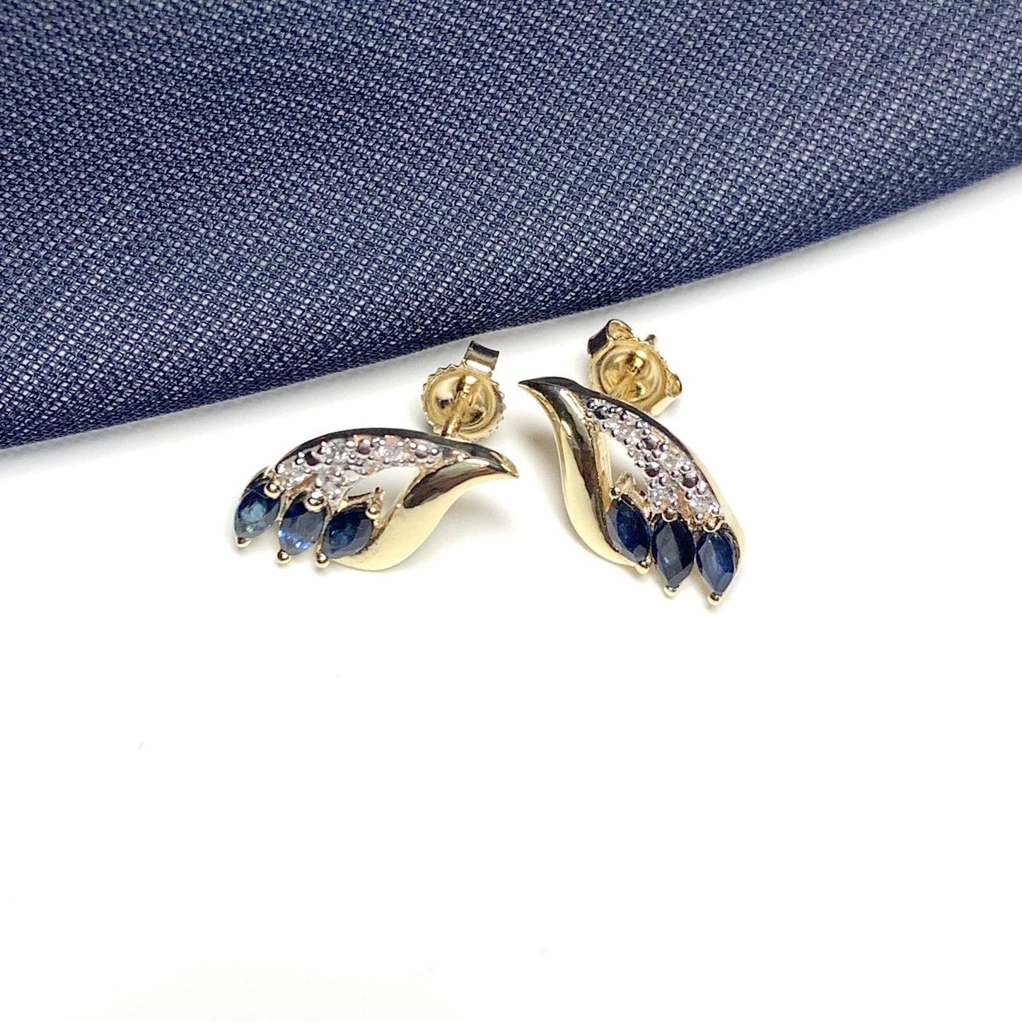 Yellow gold sapphire and diamond spray stud earrings