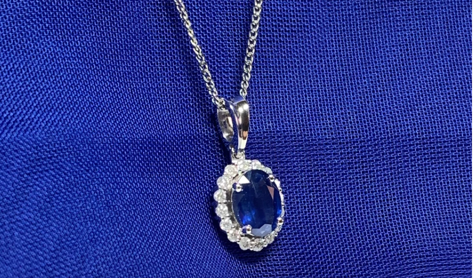 a beautiful sapphire and diamond pendant