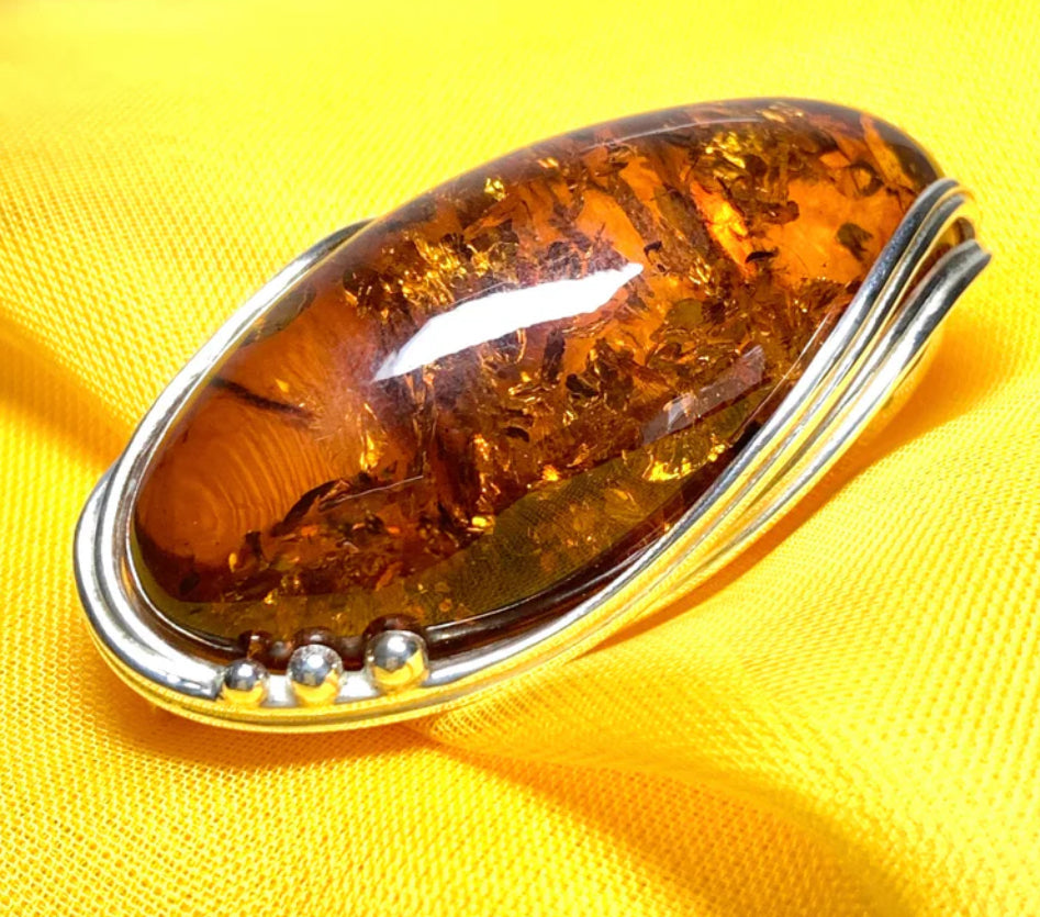 Amber Brooches