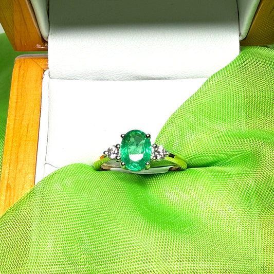 1.15 carat real green emerald and diamond 18 carat yellow gold oval trilogy dress ring