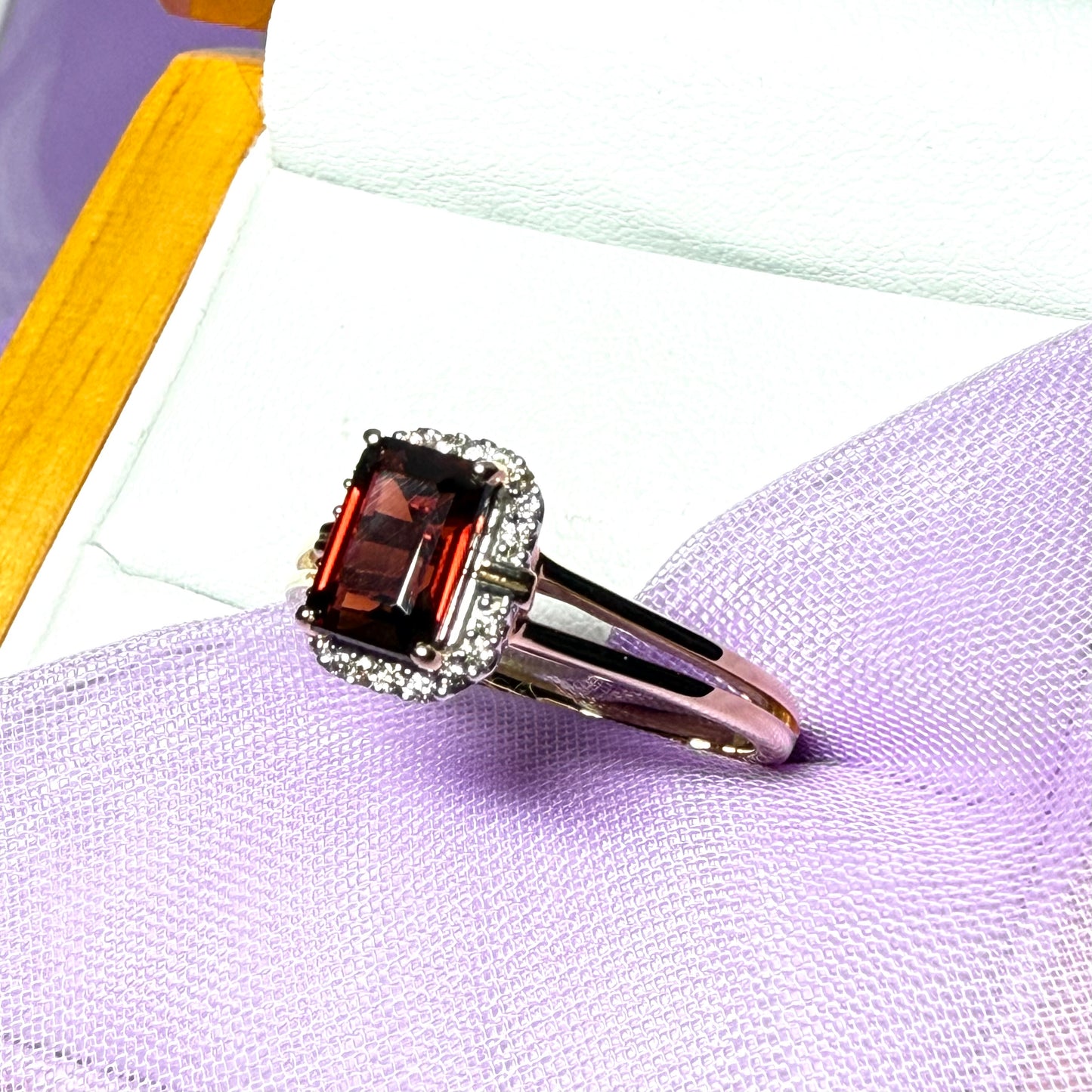 1.25 Carat garnet and diamond yellow gold octagonal cluster ring