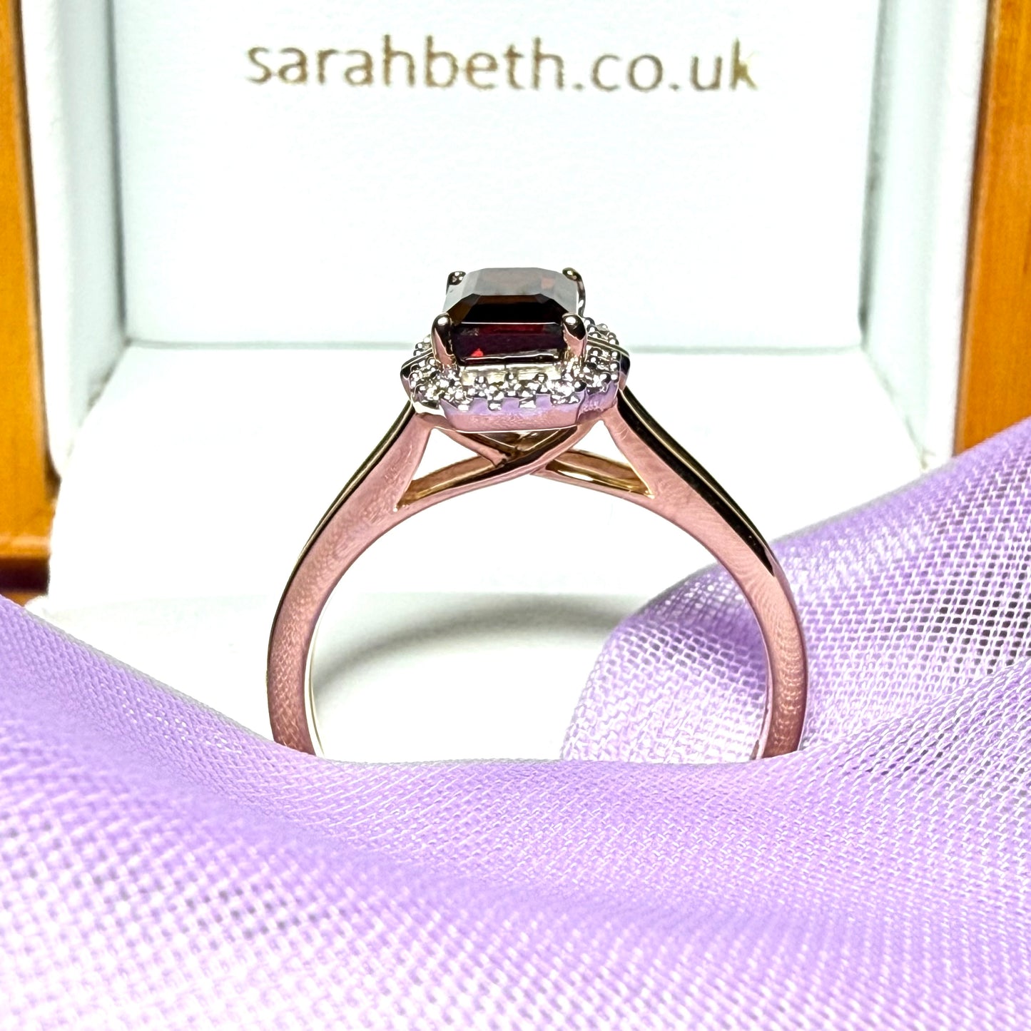 1.25 Carat garnet and diamond yellow gold octagonal cluster ring