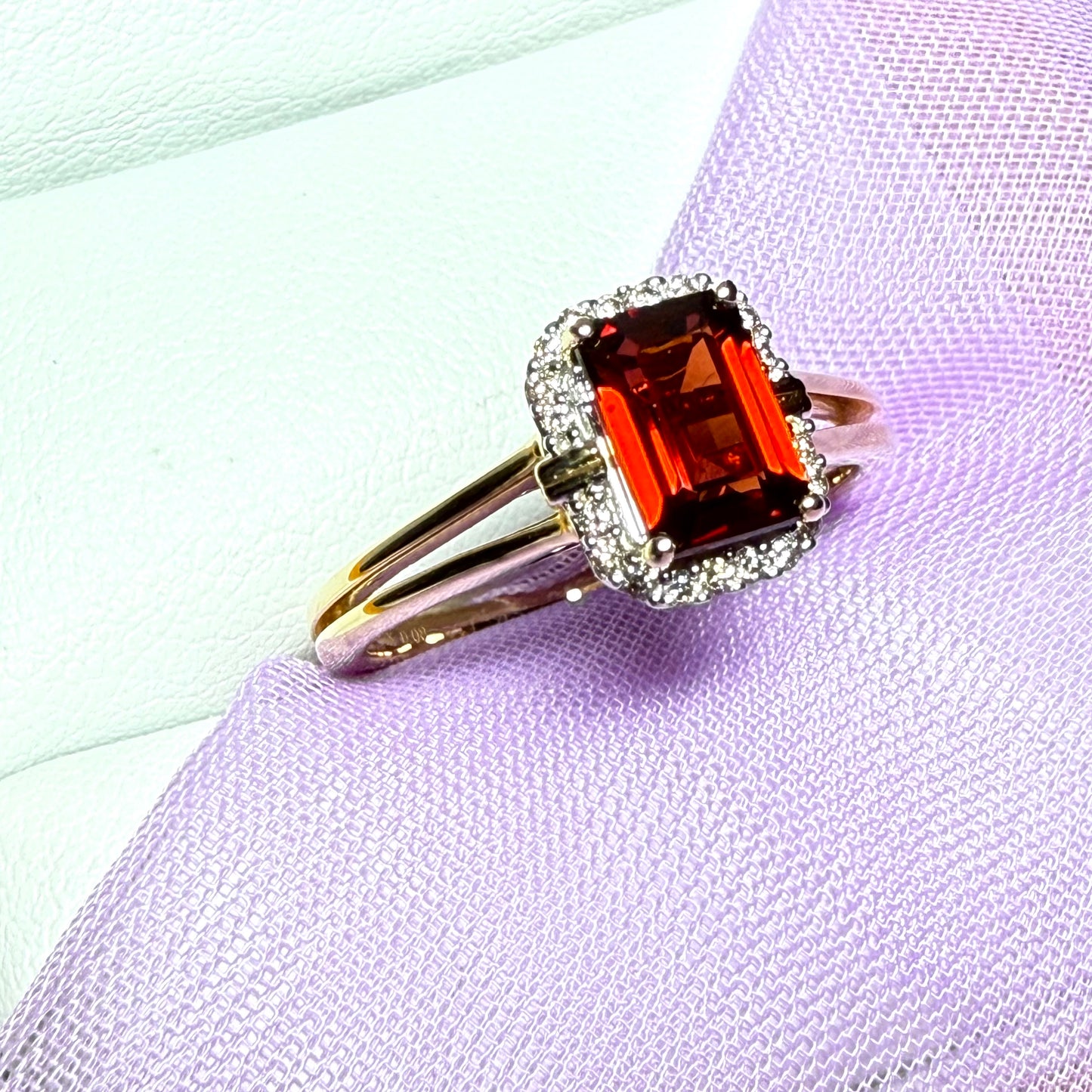 1.25 Carat garnet and diamond yellow gold octagonal cluster ring