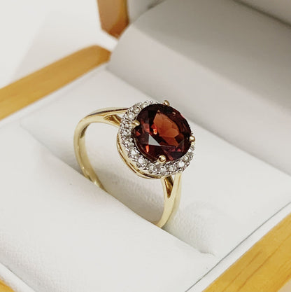 Yellow Gold Round Garnet And Diamond Cluster Ring