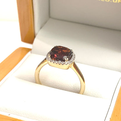 2.8 carat Garnet Cushion Shaped 18 Carat Yellow Gold Garnet And Diamond Cluster Ring