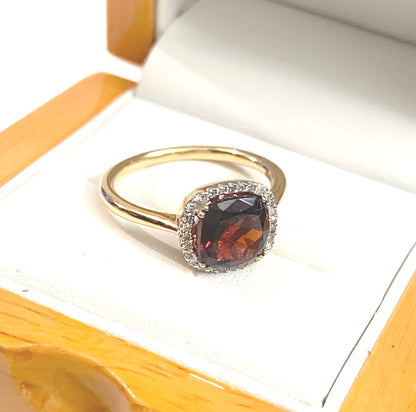 2.8 carat Garnet Cushion Shaped 18 Carat Yellow Gold Garnet And Diamond Cluster Ring