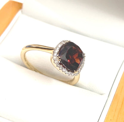 2.8 carat Garnet Cushion Shaped 18 Carat Yellow Gold Garnet And Diamond Cluster Ring