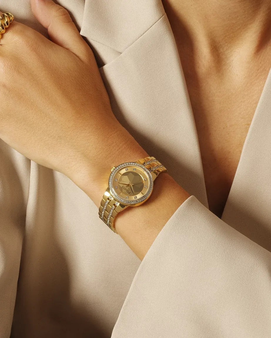 96L176 Bulova Crystal Set Bracelet Watch Stainless Steel Striking Gold Dial Phantom on the wrist