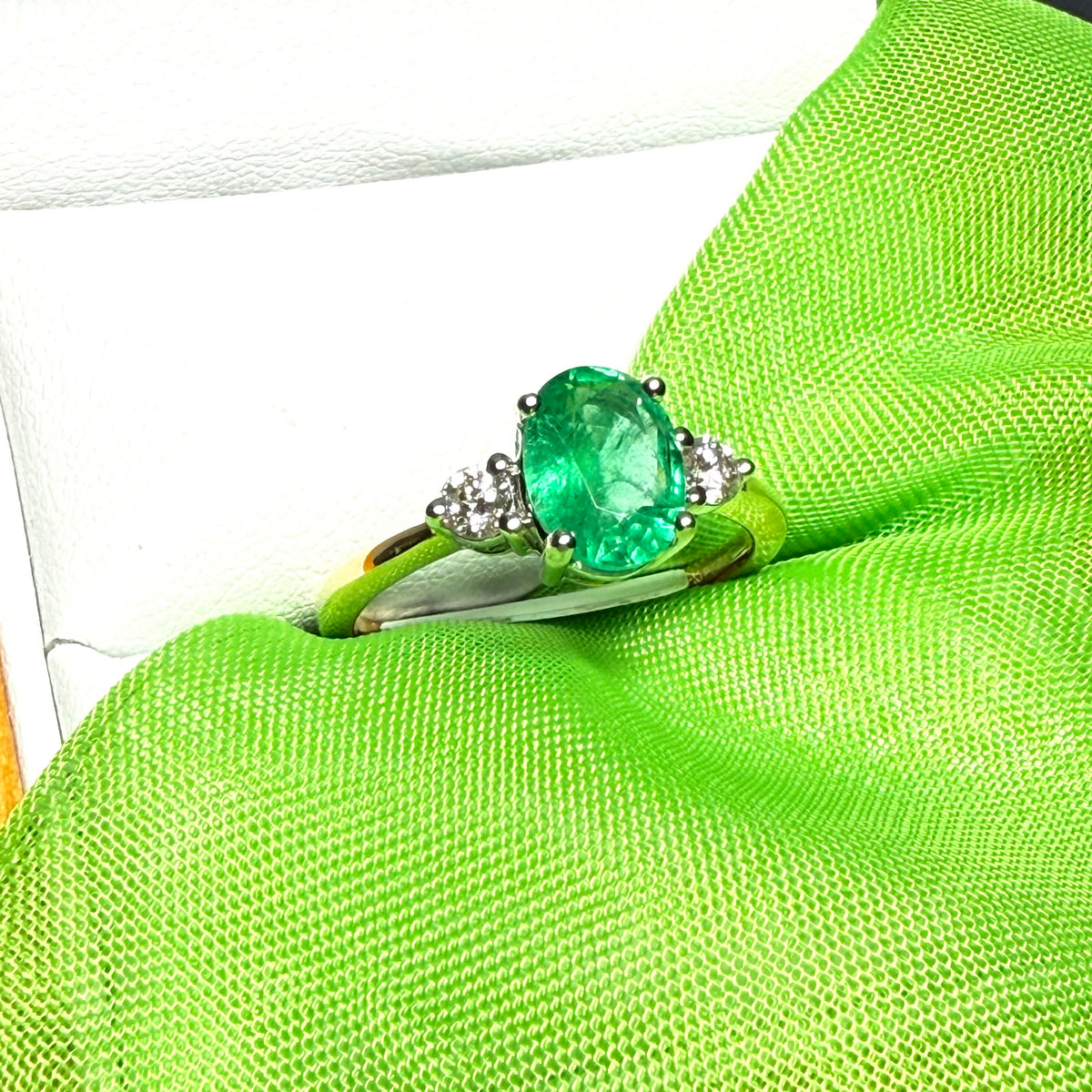 1.15 carat real green emerald and diamond 18 carat yellow gold oval trilogy dress ring