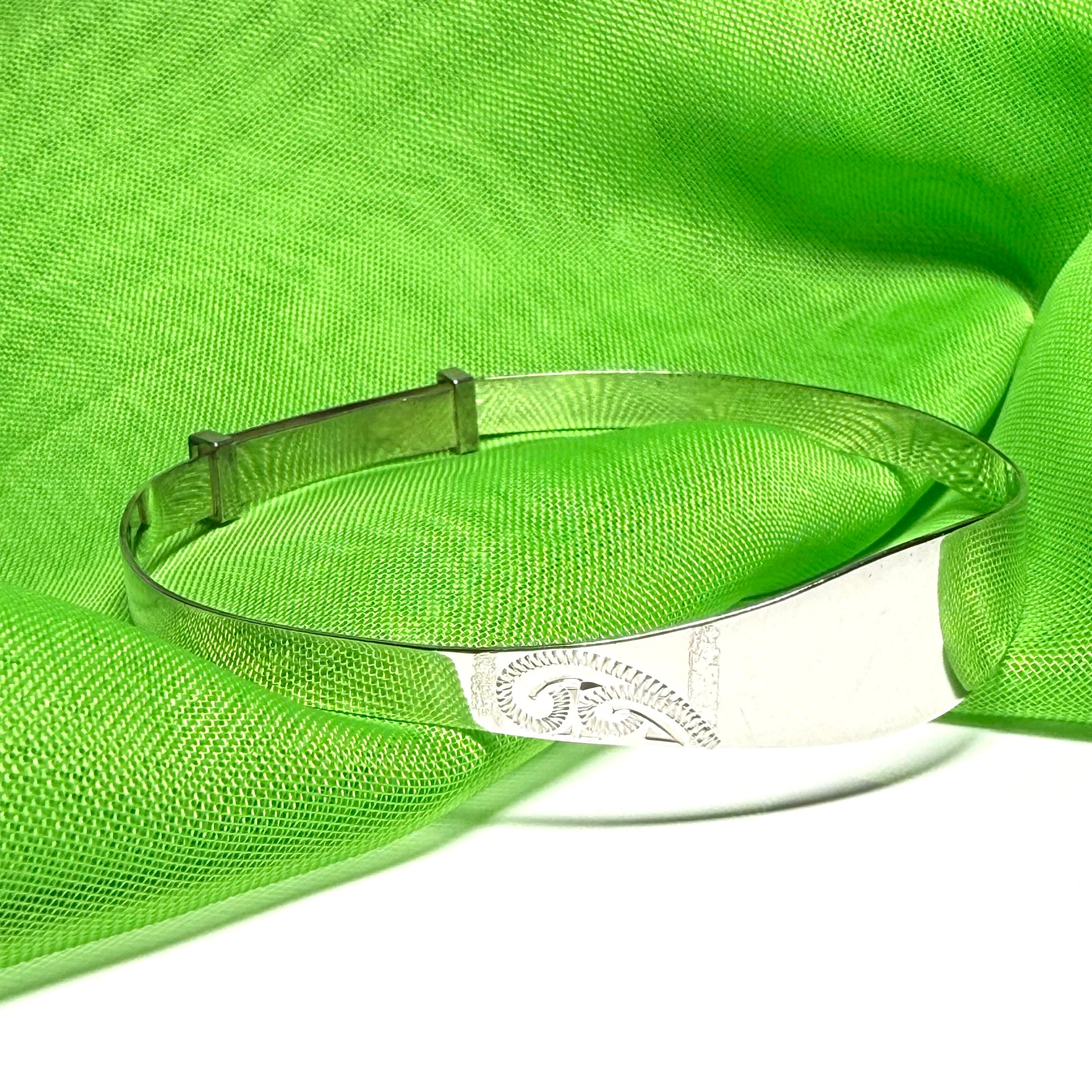 Childs expanding bangle identity designed swirl patterned sterling silver