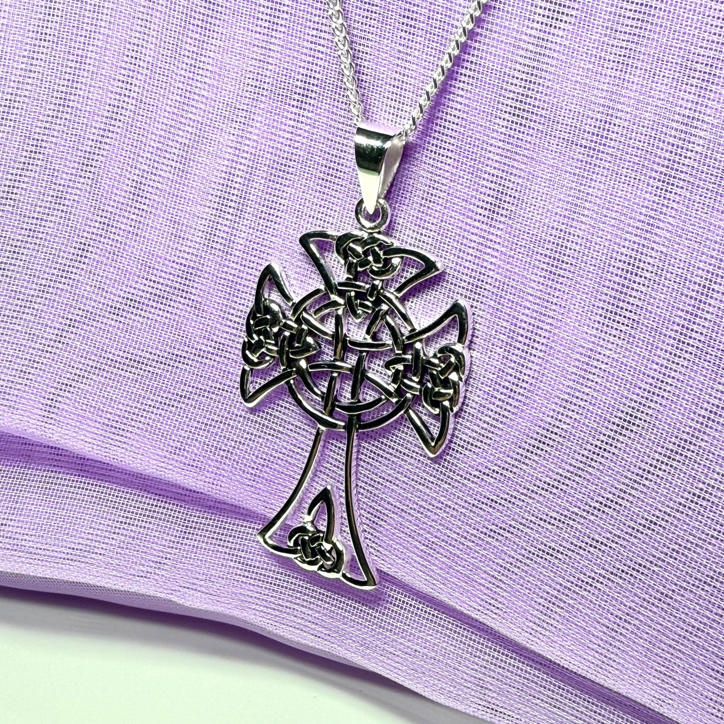 A Large Fancy Patterned Sterling Silver Celtic Cross Including Chain