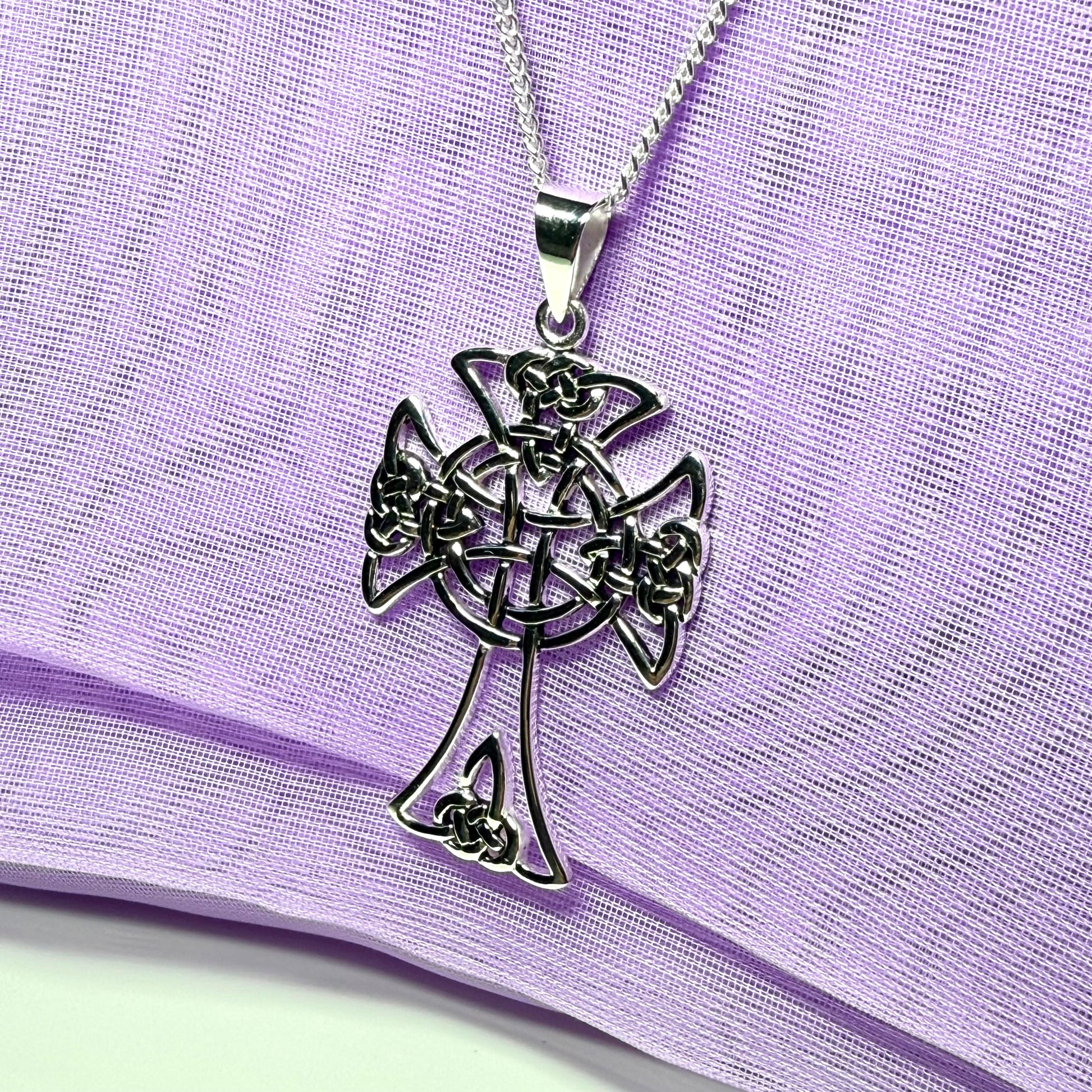 A Large Fancy Patterned Sterling Silver Celtic Cross Including Chain
