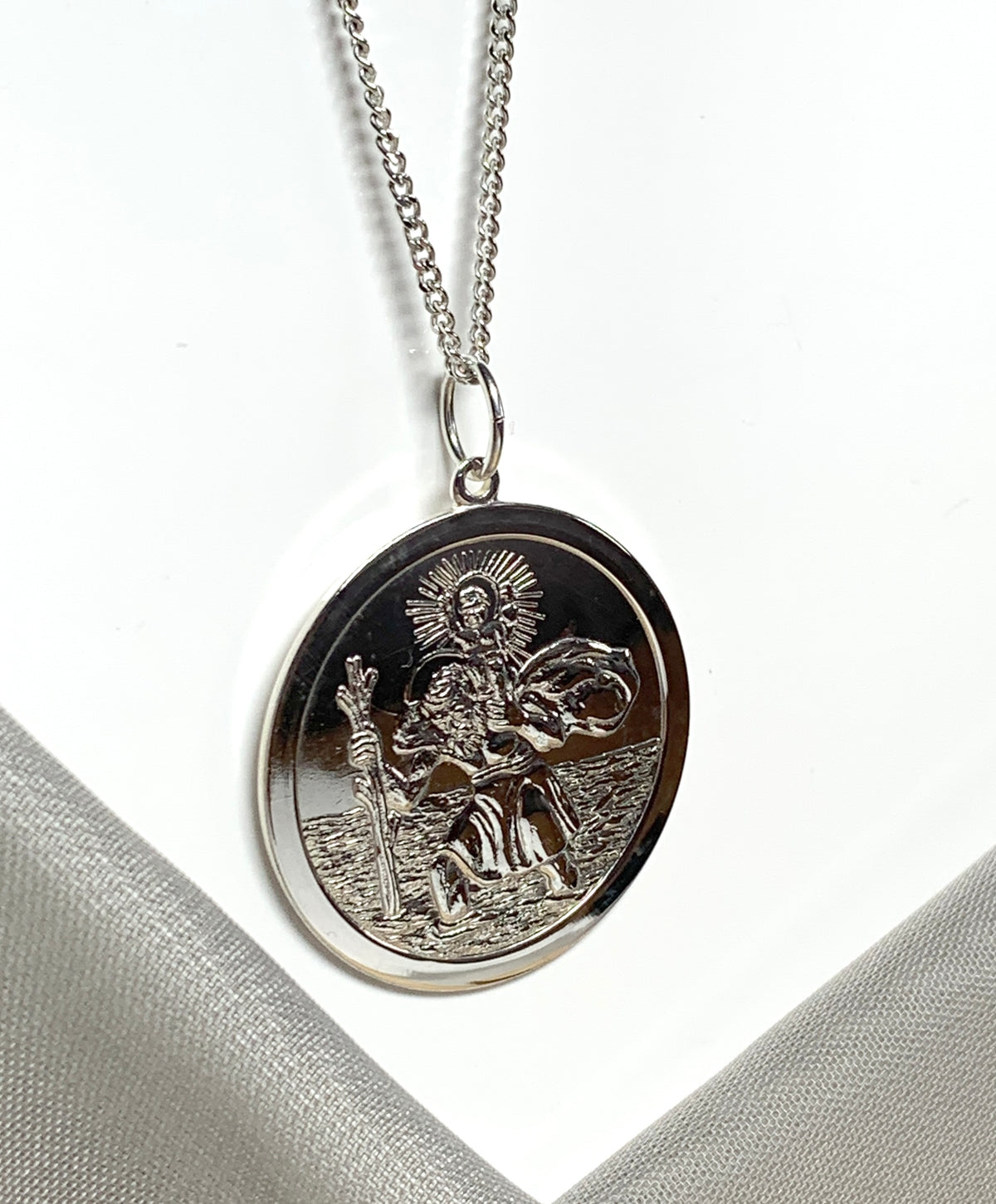 Very large solid men’s round sterling silver St. Christopher and chain