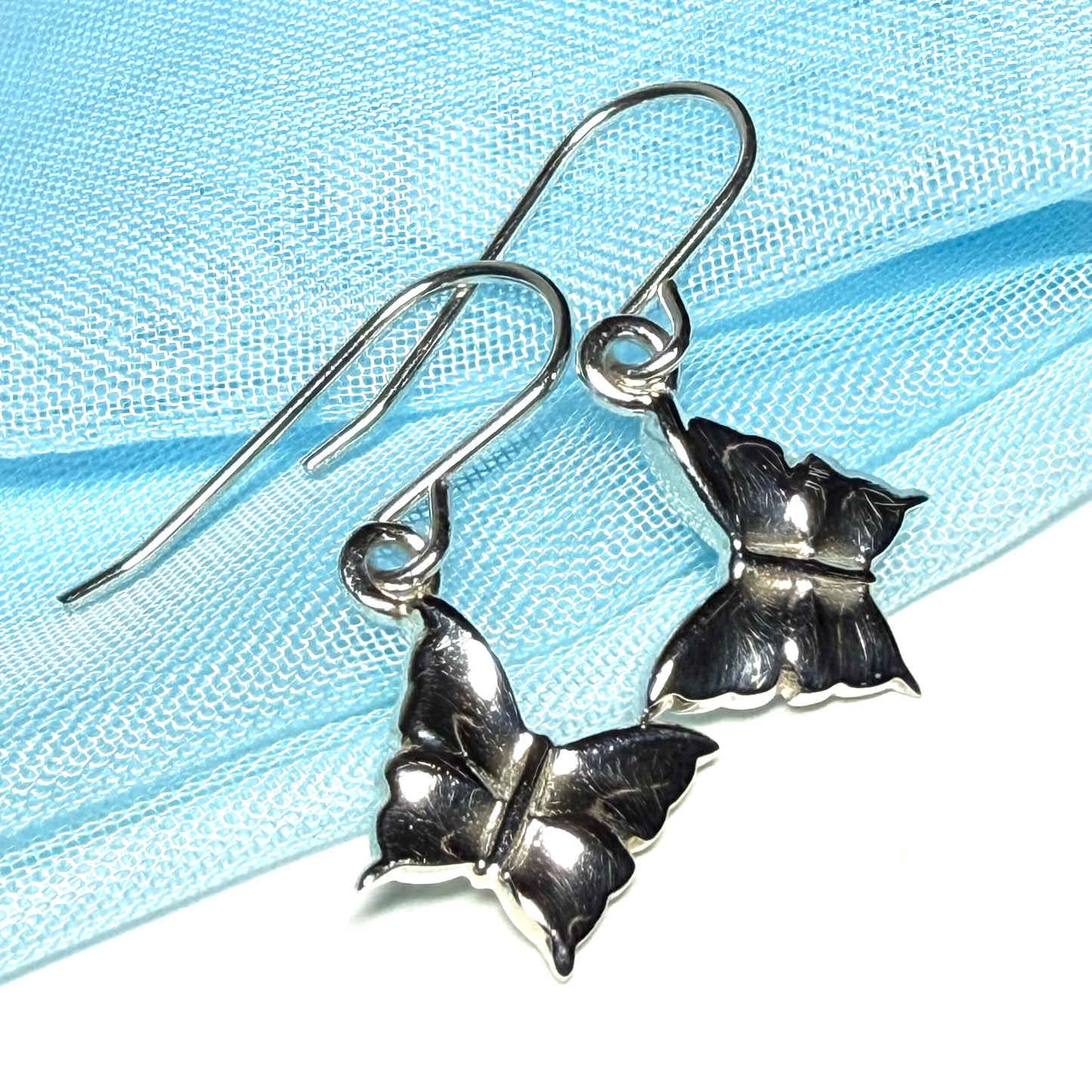 Ladies butterfly shaped drop earrings sterling silver