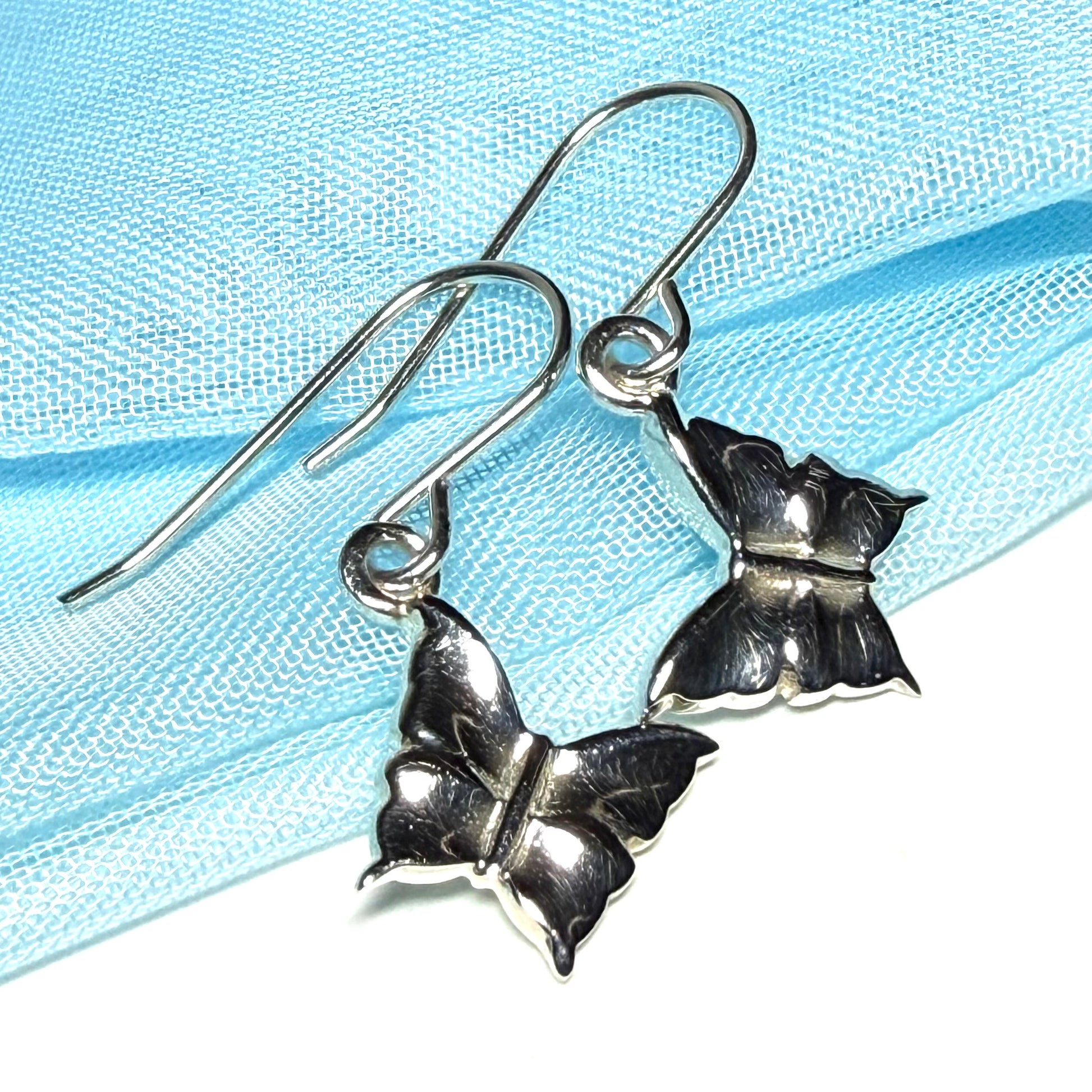 Ladies butterfly shaped drop earrings sterling silver