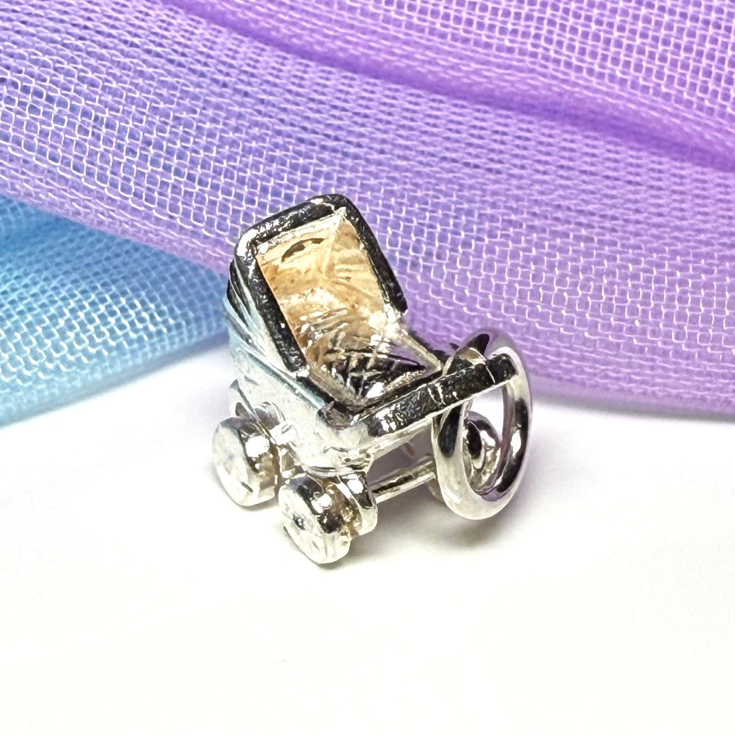 A Pram Shape Charm Sterling Silver