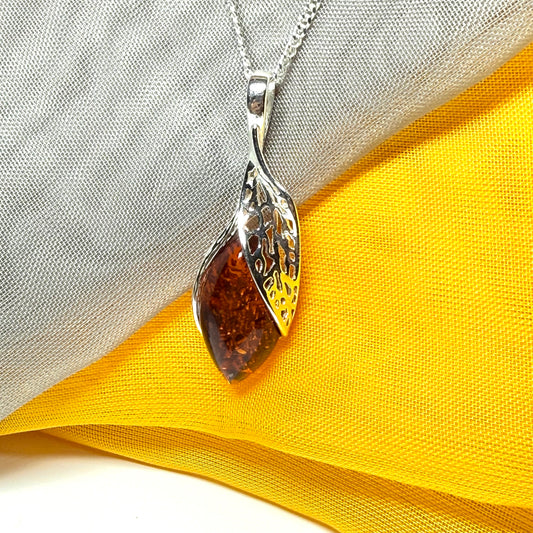 Real amber marquise sterling silver necklace with a swirl set fancy open pendant with chain