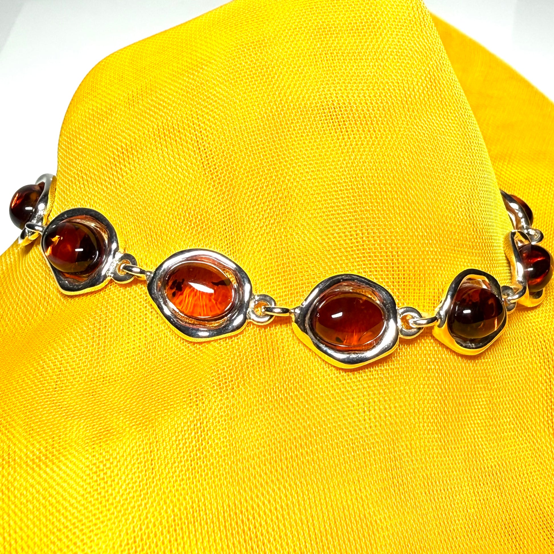 Real amber sterling silver fancy oval shaped bracelet