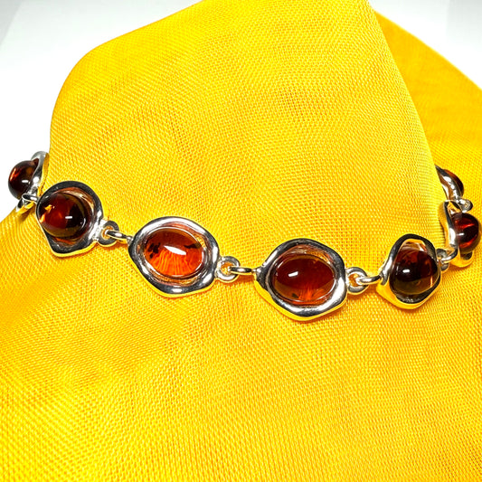 Real amber sterling silver fancy oval shaped bracelet