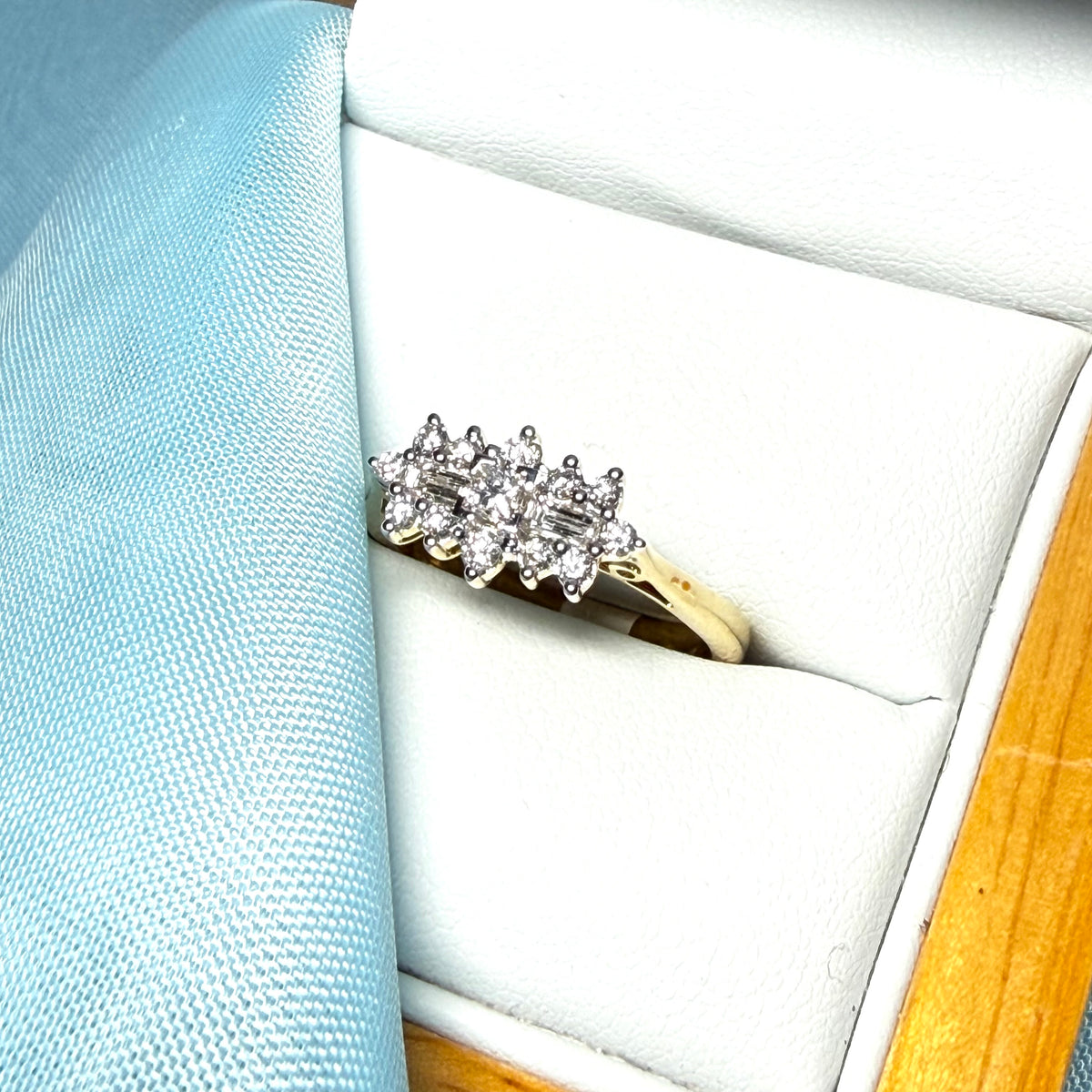 Real diamond cluster ring 18 carat yellow gold baguette and round cut