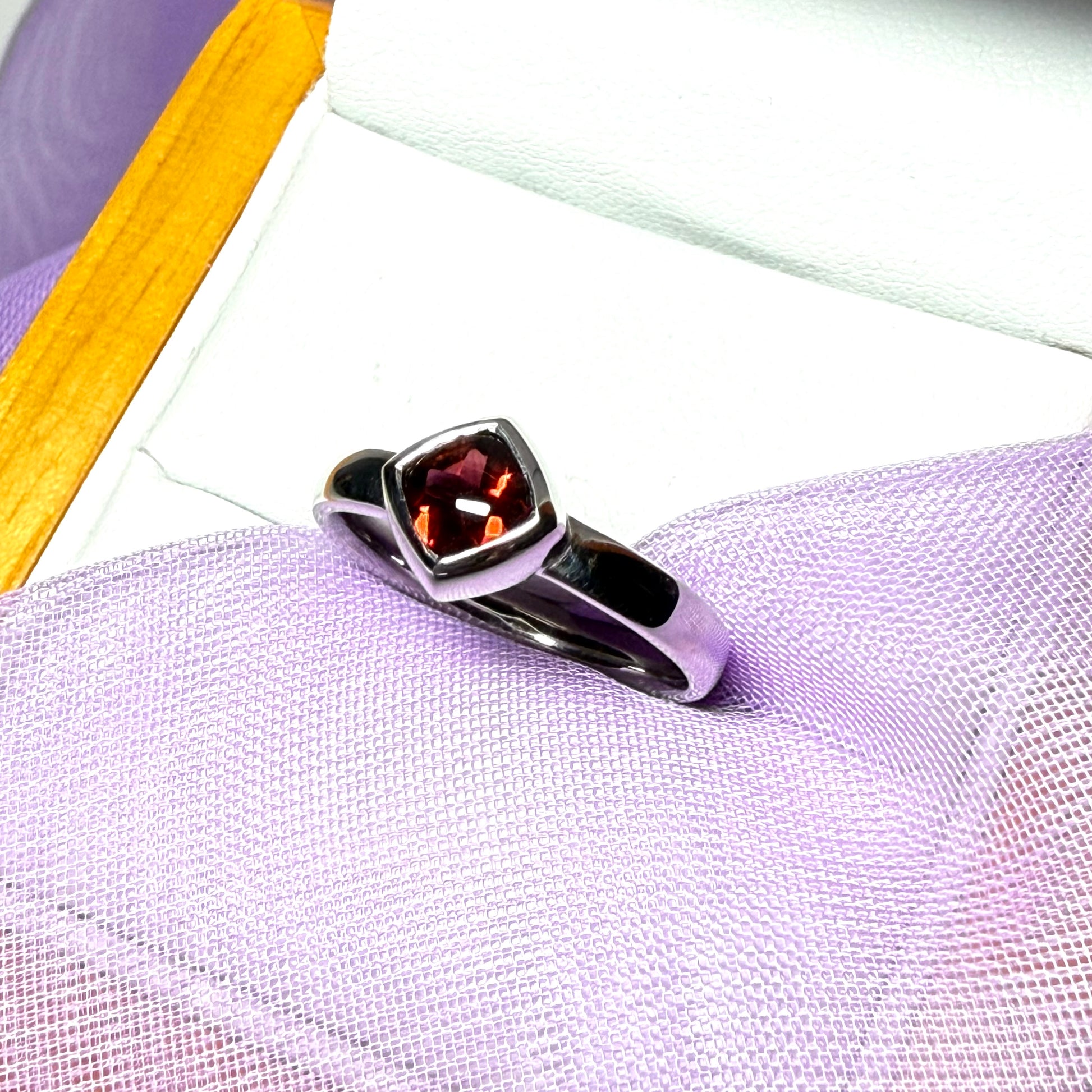 Real garnet ring white gold