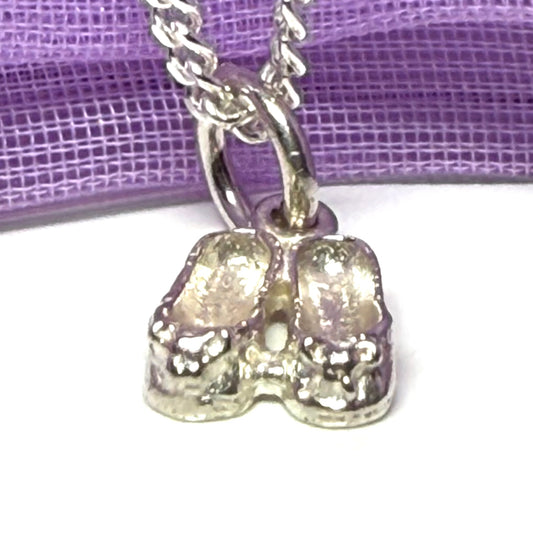 Small ballerina slippers shaped sterling silver necklace